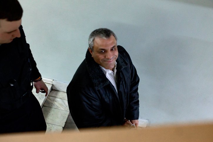 Anatoliy Yevtushenko watches his friends and family as bailiffs lead him away in handcuffs from the courtroom. December 2025.